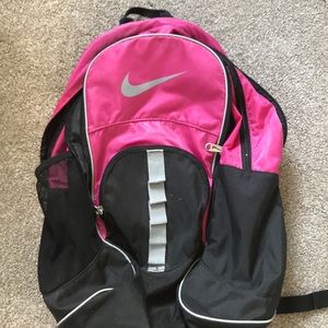Nike pink and black backpack